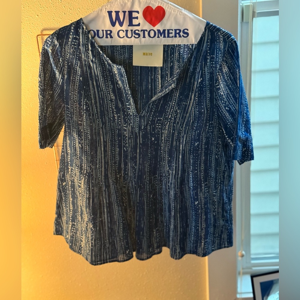 Maeve Blue Peplum Top from Anthropologie